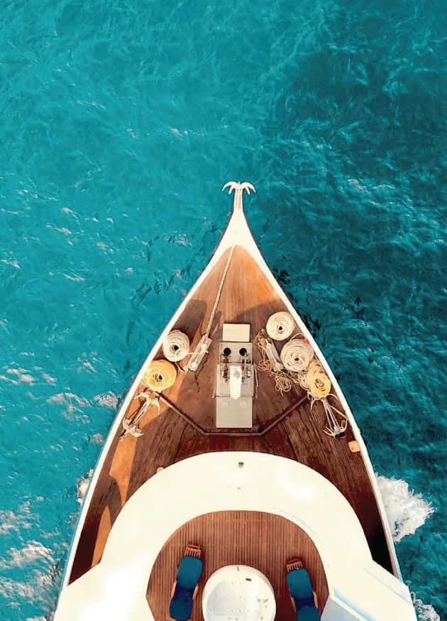 Long-tail boat on the clear water off Phuket